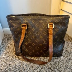 Gently used Louis Vuitton handbag/purse.
